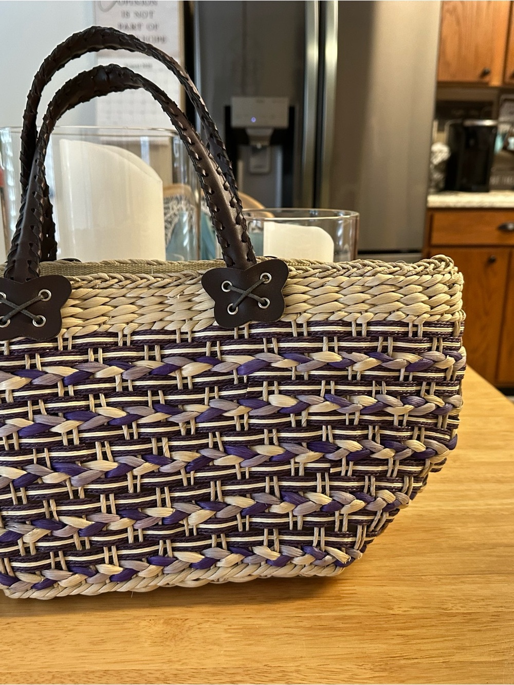 Woven Straw Satchel with Purple Accents and Dark Handles